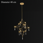 Celeste crystal chandelier 40 cm, gold, lit on a black background