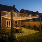 8 m × 10 m LED net mesh fairy lights covering a UK garden