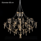 Celeste crystal chandelier 80 cm, lit on a black background