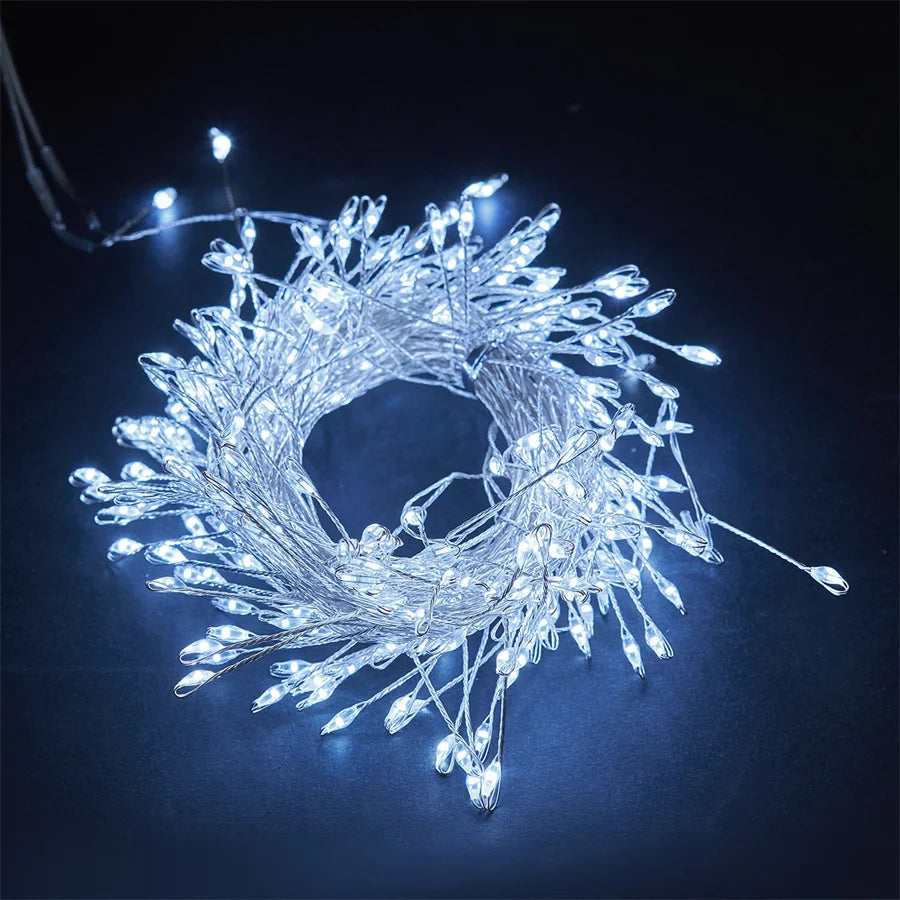 White firecracker cluster fairy lights on a dark background