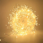Warm white cluster fairy lights glowing in a coil