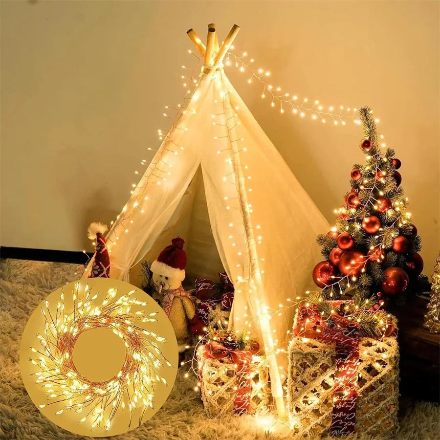 Warm white firecracker cluster lights decorating a teepee tent and Christmas tree