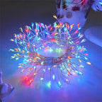 Multicolour firecracker cluster lights in a loose coil