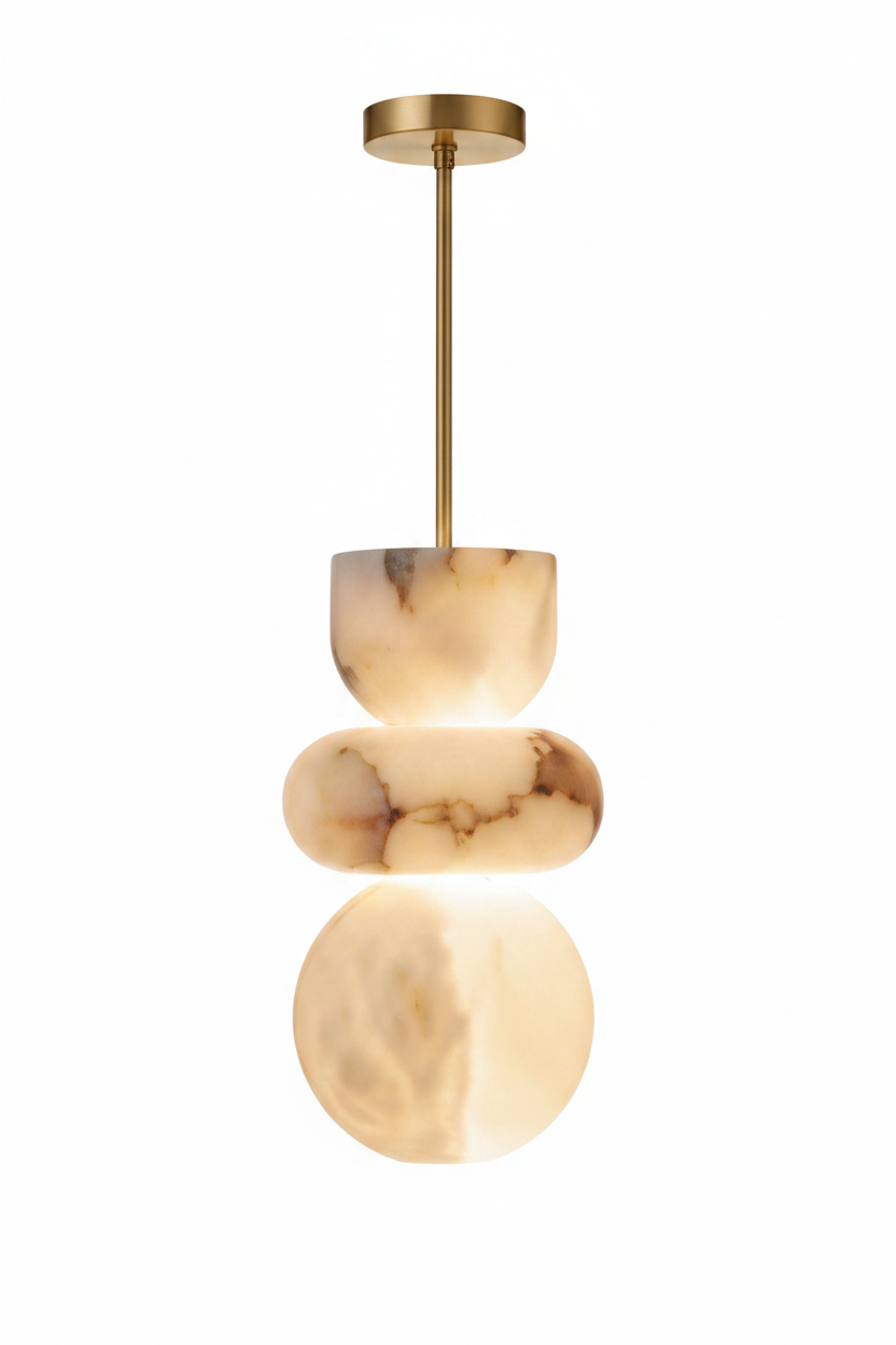 Stacked alabaster marble pendant light with brass canopy and copper pipe on a white background