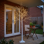 Birch tree lights on a sheltered UK courtyard patio