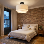Black-canopy lamp in a modern British bedroom