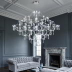 Chrome chandelier with cool white lights in a British living room
