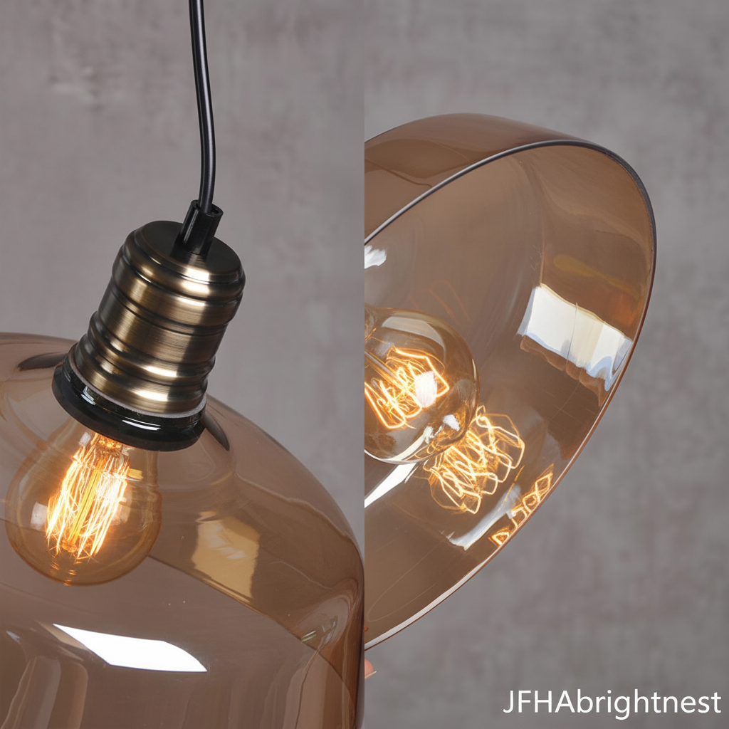Close-up of the amber glass barn shade and antique brass lamp holder