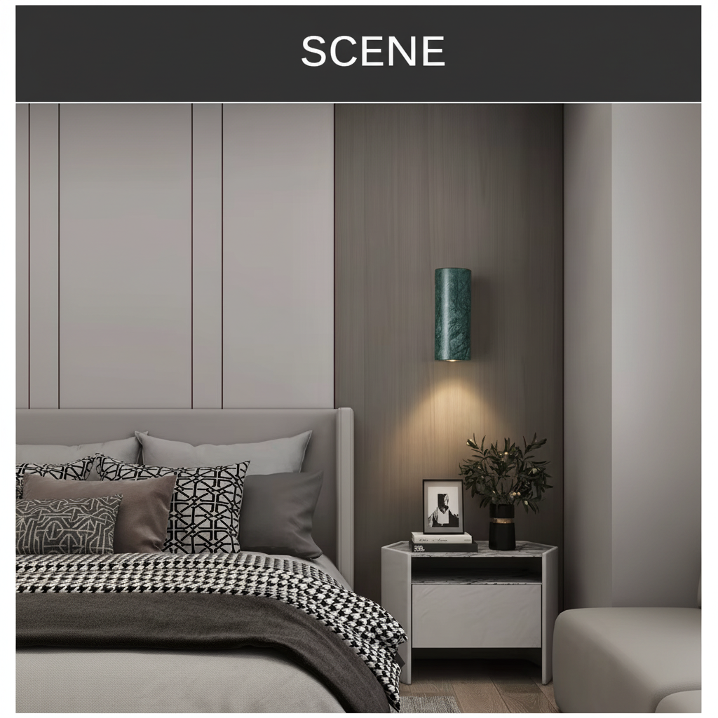 Round green marble wall light mounted beside a bed, lighting the bedside table below