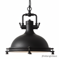 Edison Noir industrial dome pendant light in matte black, shown with chain and frosted glass diffuser