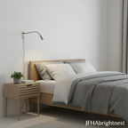 Brushed nickel Halden reading wall light mounted beside a bed