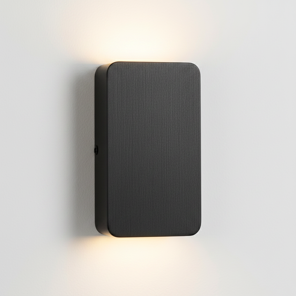 Close-up of the Ingram wall light in black brushed metal