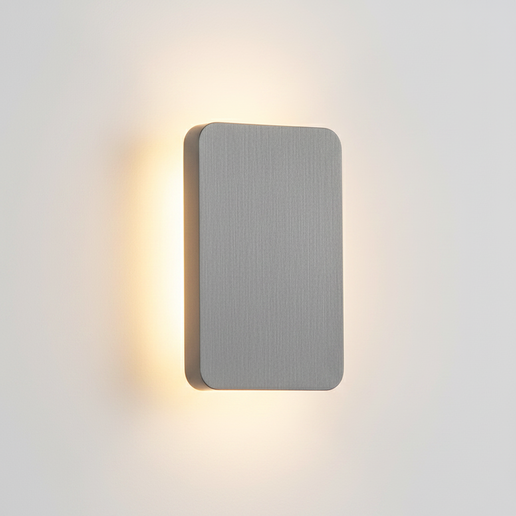 Close-up of the Ingram wall light in grey brushed metal