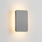 Close-up of the Ingram wall light in grey brushed metal