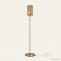 Seren crystal floor lamp in gold, 160cm tall, on a plain cream background