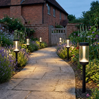 2-pack solar pathway lights along a UK cottage garden path