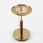 Table lamp with glass shade removed showing the LED light source