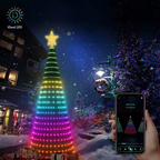 RGB Christmas tree lights glowing in a snowy outdoor scene