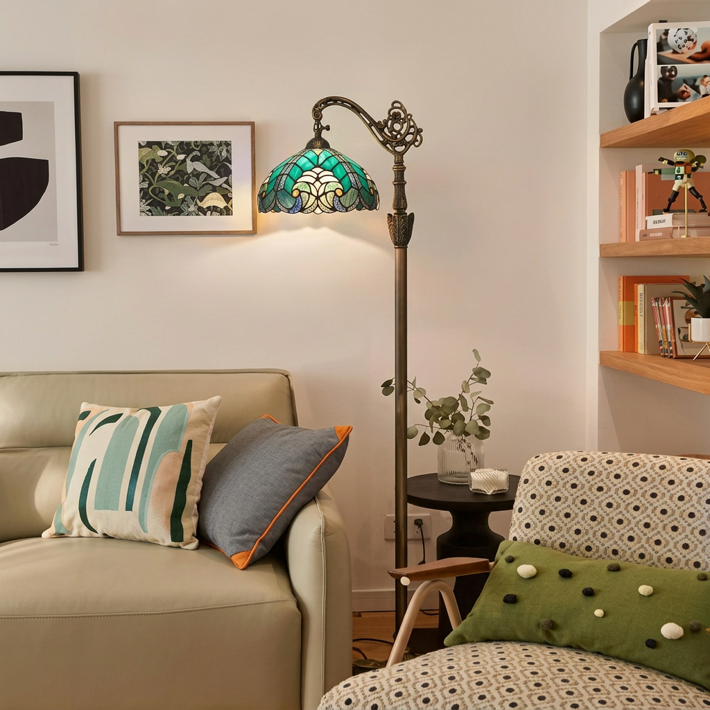 Victorian Tiffany floor lamp with teal stained glass shade beside a sofa in a bright living room
