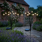 2 pack solar firefly lights in a UK cottage garden