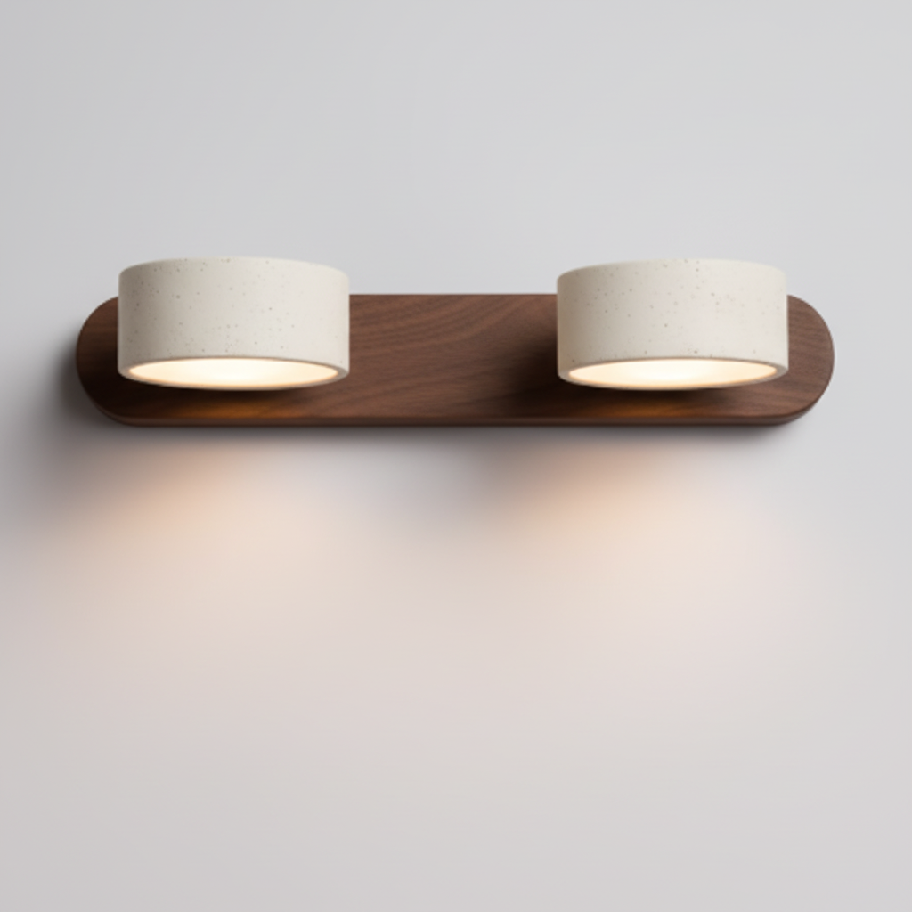 Walnut 2-light travertine wall light glowing warm white on a plain wall