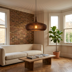 Walnut slatted pendant light with herringbone floor and exposed brick