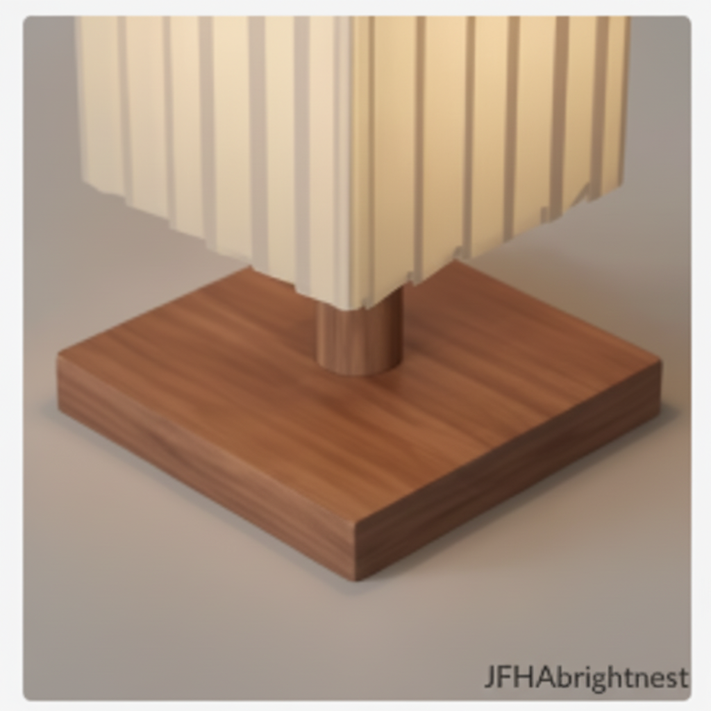 Close-up of the Yuki floor lamp's pleated fabric column meeting its square walnut wood base